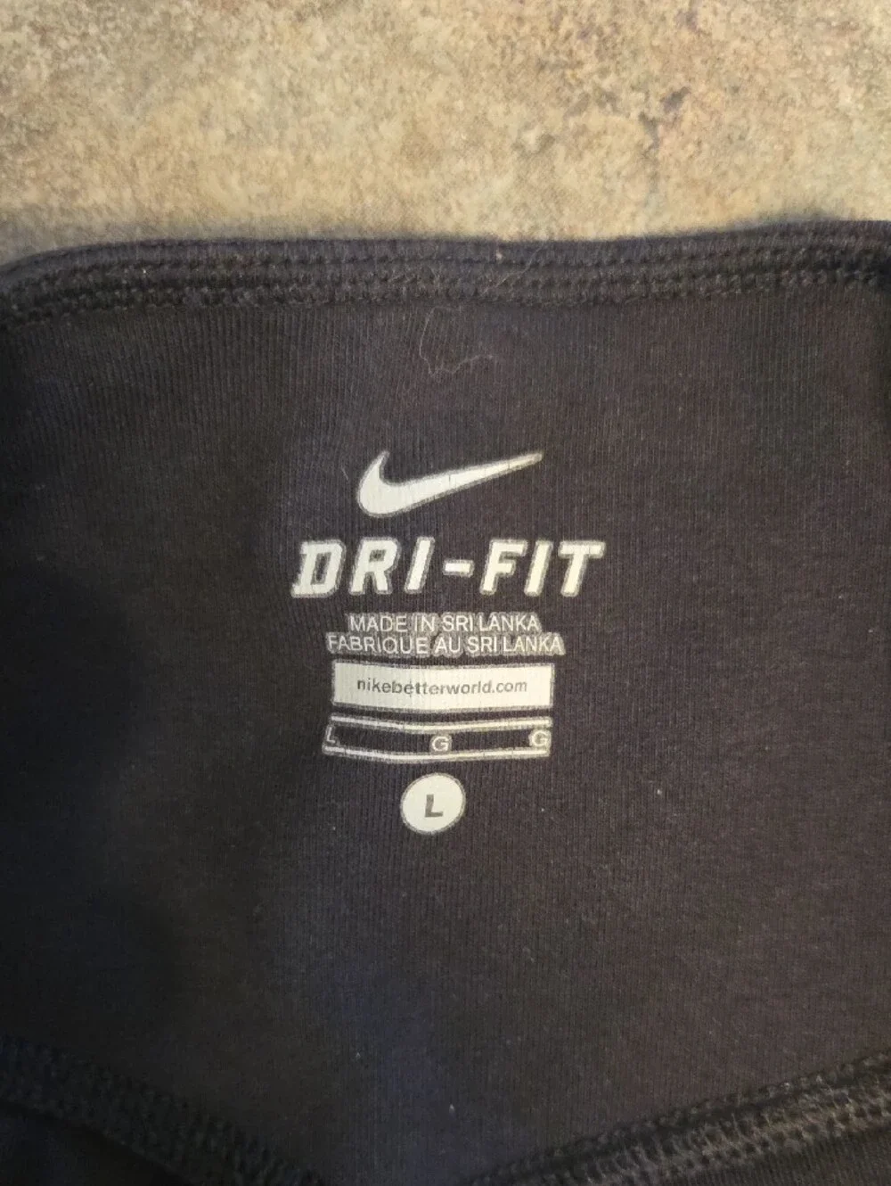 Nike Black Capri Yoga Joggers with White Swoosh
